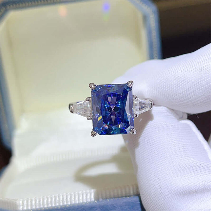 Blue Moissanite Ring 5 Carat Sapphire set in 925 sterling silver displayed in a jewelry box.